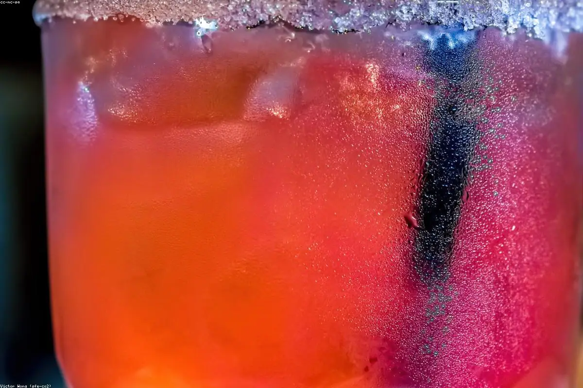 Kids garnishing colorful alcohol-free mocktails