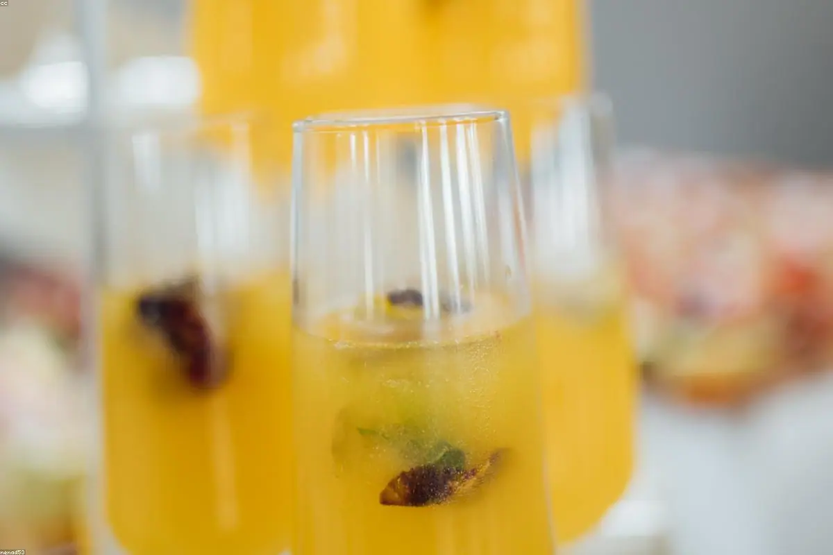 A group raising cocktail glasses in a toast